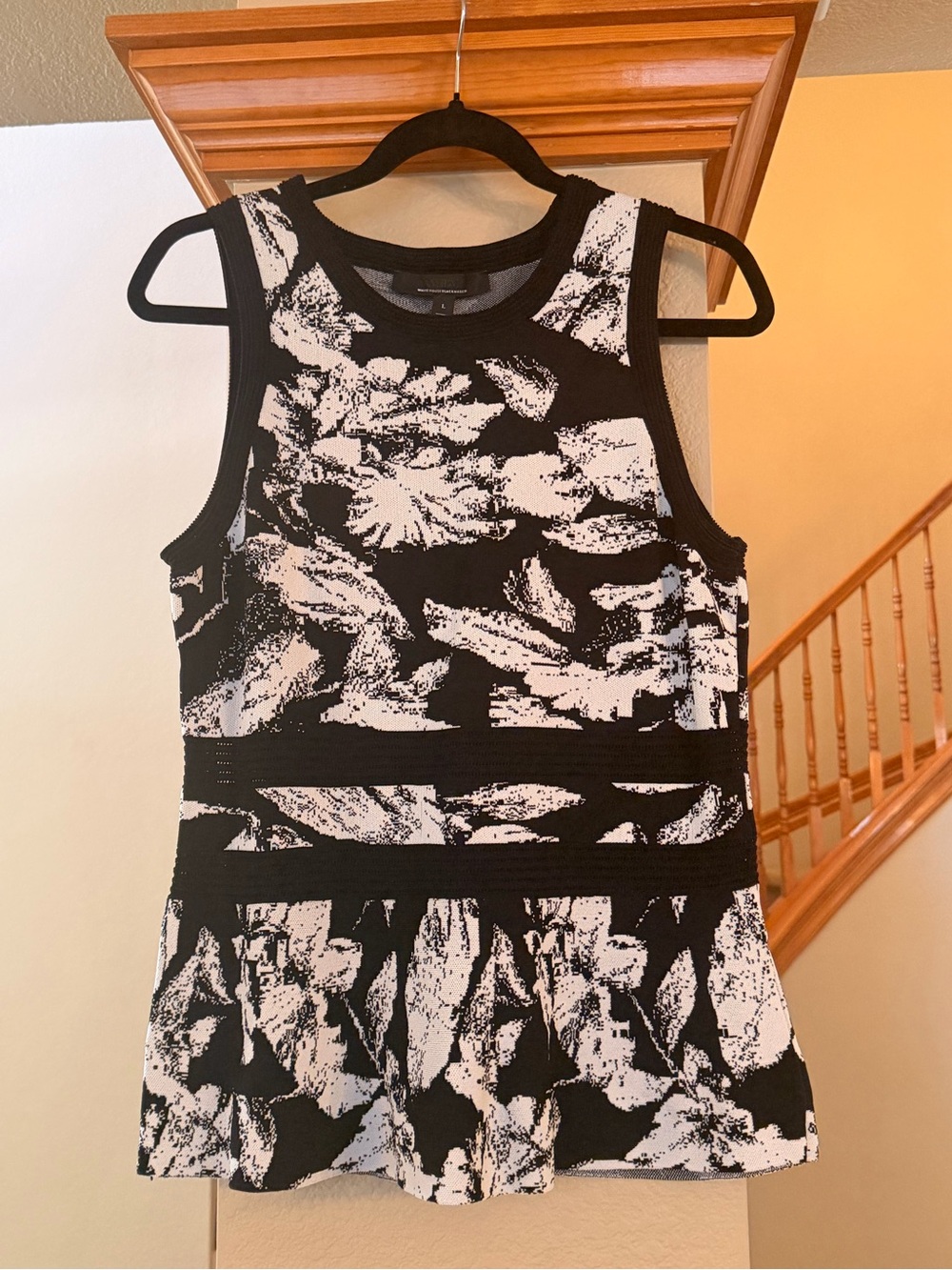 Black and White Abstract Print Sleeveless Peplum Top
